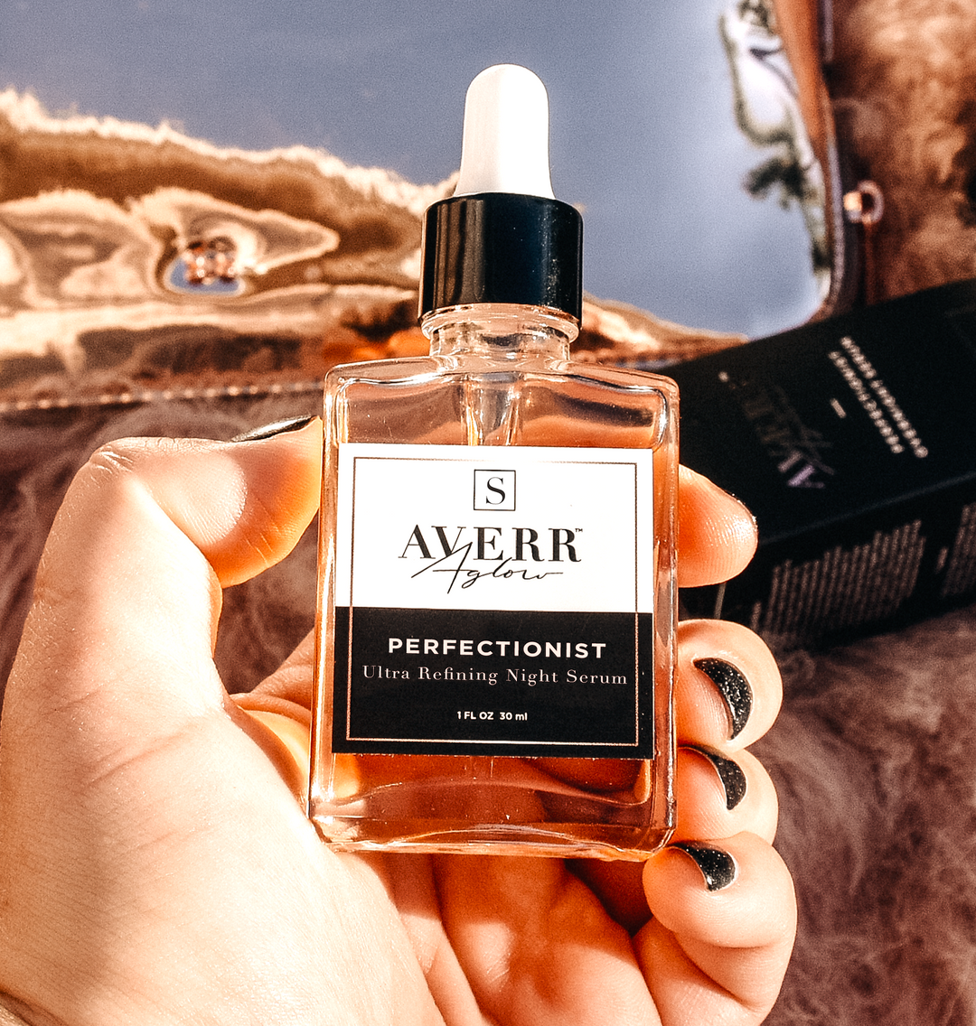 Model's hand with Averr Aglow perfectionist serum